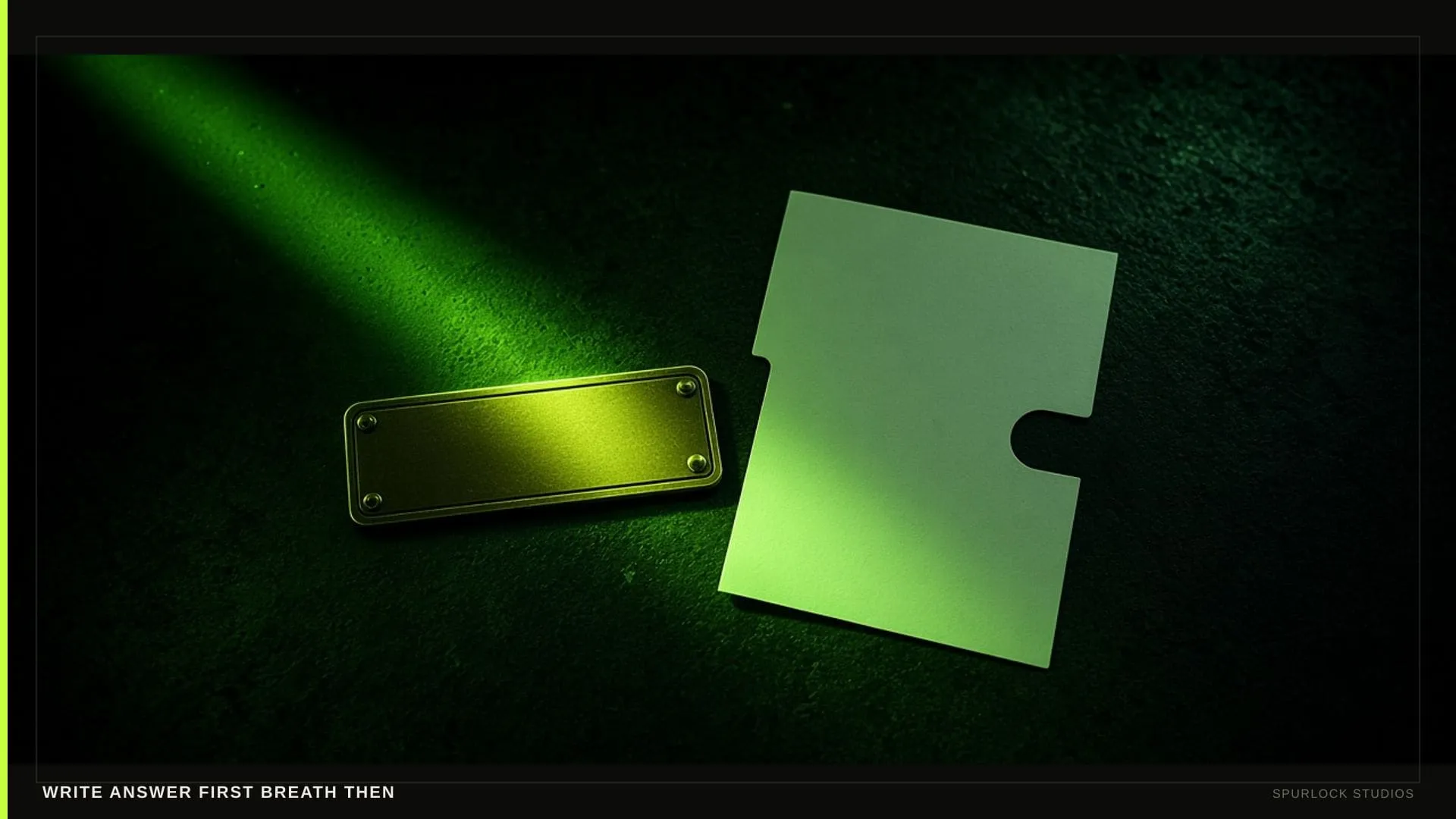 A lime beam hitting a small brass nameplate. Thesis: WRITE ANSWER FIRST BREATH THEN.
